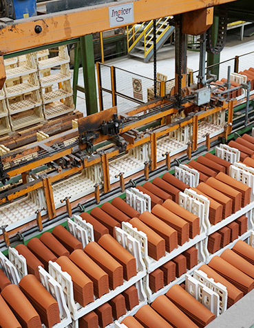 Spanish and European Style Clay Tiles in Production Colorful Spanish and European style clay tiles in an industrial setting.