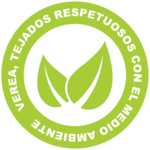 Green eco-friendly roofing badge with leaf design, promoting environmental respect.