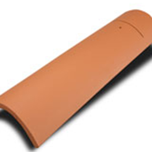 Close-up of a single terracotta roof tile showcasing its smooth, curved design.