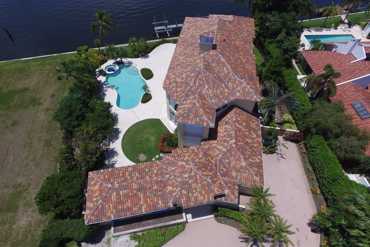 Elegant Home with Jacobean Style Roof and Pool by the Water